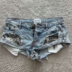 One Teaspoon Light Blue Distressed Denim Shorts with Silver Sequin Panels